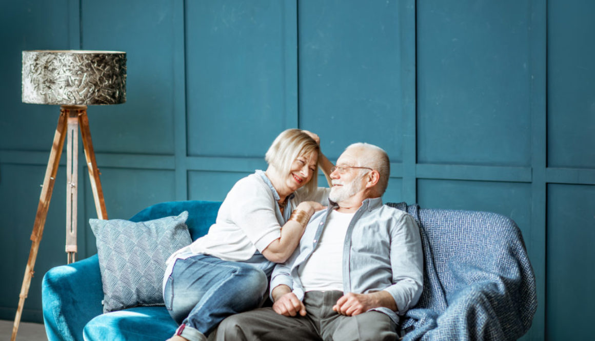 Senior couple on the couch at home