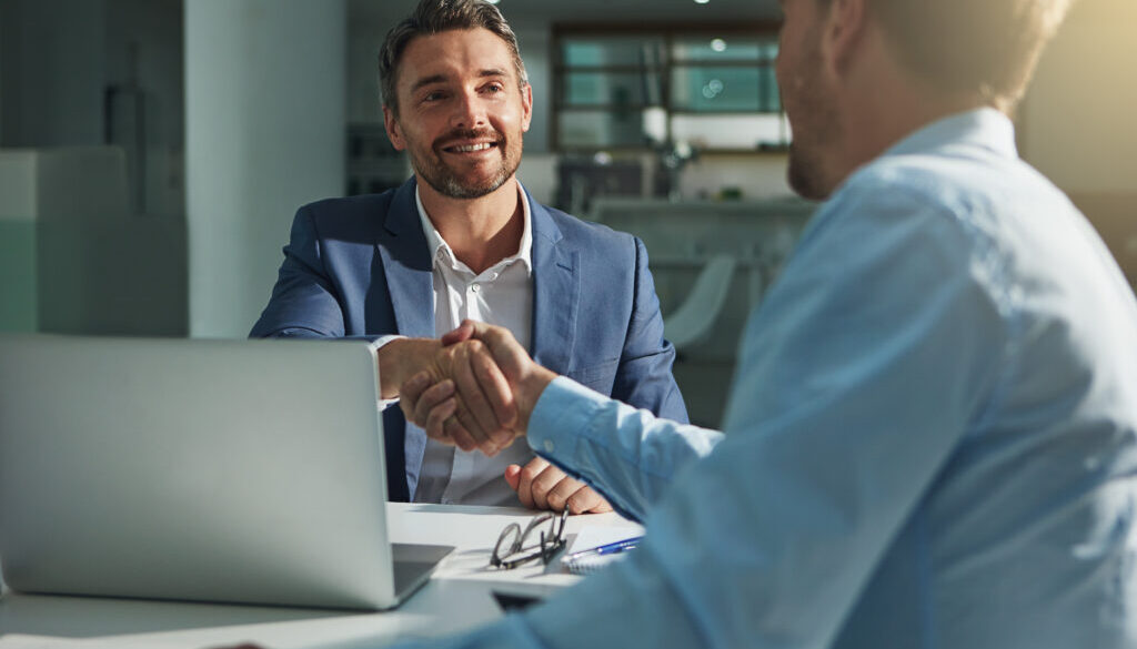 Business people, handshake and interview success or recruitment, employment and hiring in office. Corporate, men and executive shaking hands with new employee or collaboration on deal or partnership